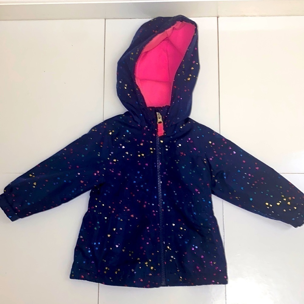 Osh kosh baby navy windbreaker with multi colored hearts. Size 12 months. EUC.